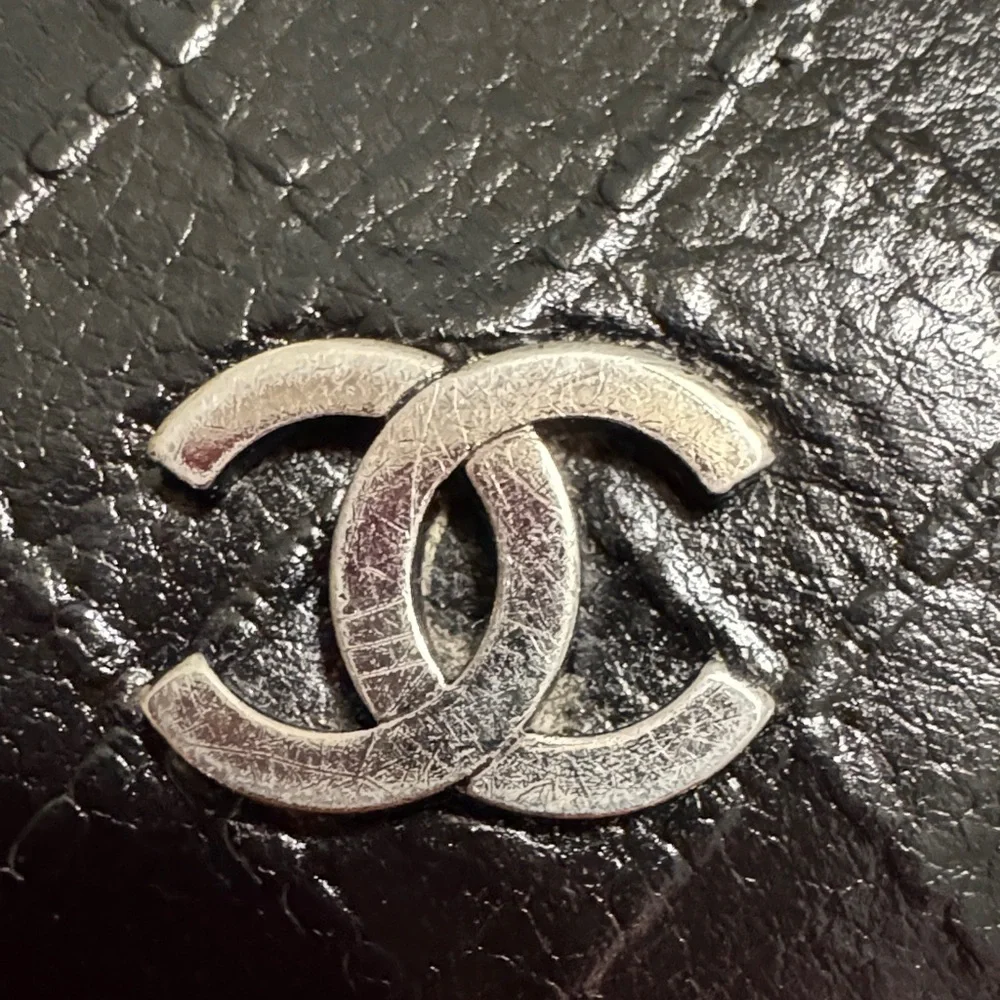 CHANEL Black Leather Wallet with Silver Logo